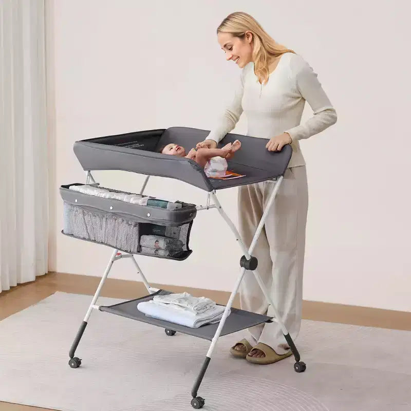 Table à langer VEVOR, Station à langer pliable avec panier latéral, roulettes verrouillables, organiseur de rangement multifonctionnel pour chambre de bébé, gris foncé