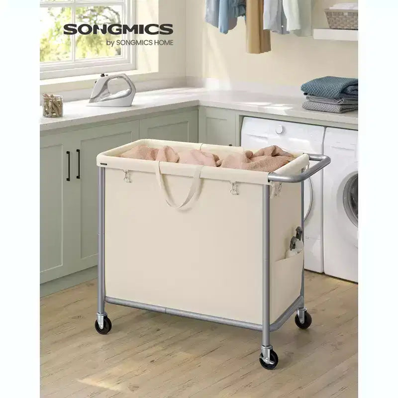 Panier à linge roulant avec doublure amovible, panier à roulettes de 180 litres avec freins et cadre en acier, blanc cassé