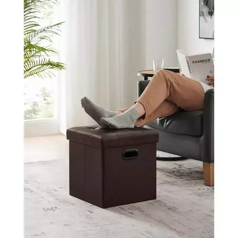 SONGMICS Pouf de rangement pliable de 38 cm, Repose-pieds cubique, Table basse avec poignées à trous, Similicuir