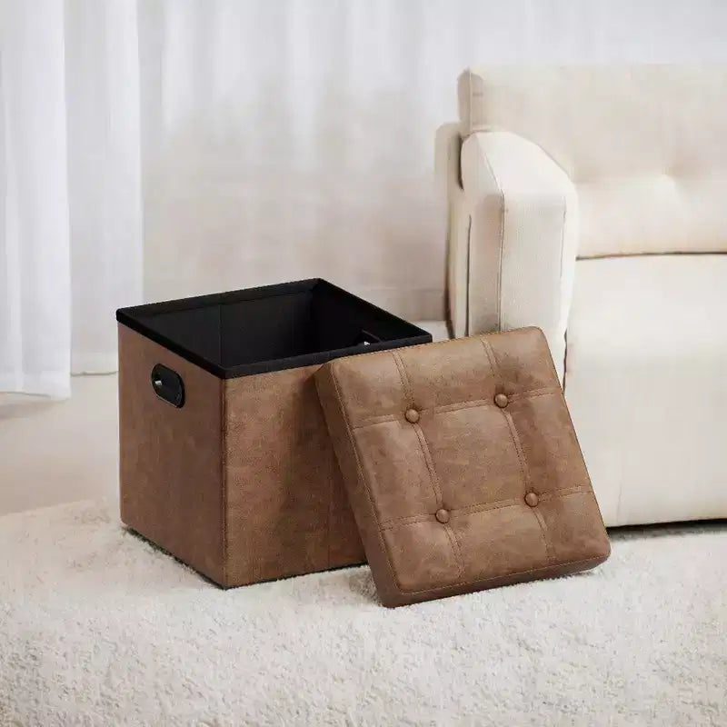 SONGMICS Pouf de rangement pliable de 38 cm, Repose-pieds cubique, Table basse avec poignées à trous, Similicuir