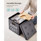 SONGMICS Pouf de rangement pliable de 38 cm, Repose-pieds cubique, Table basse avec poignées à trous, Similicuir