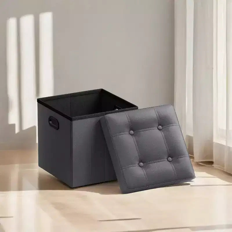 SONGMICS Pouf de rangement pliable de 38 cm, Repose-pieds cubique, Table basse avec poignées à trous, Similicuir