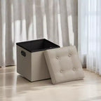 SONGMICS Pouf de rangement pliable de 38 cm, Repose-pieds cubique, Table basse avec poignées à trous, Similicuir