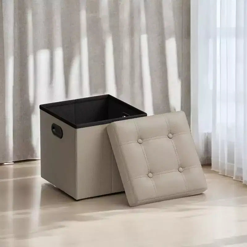 SONGMICS Pouf de rangement pliable de 38 cm, Repose-pieds cubique, Table basse avec poignées à trous, Similicuir